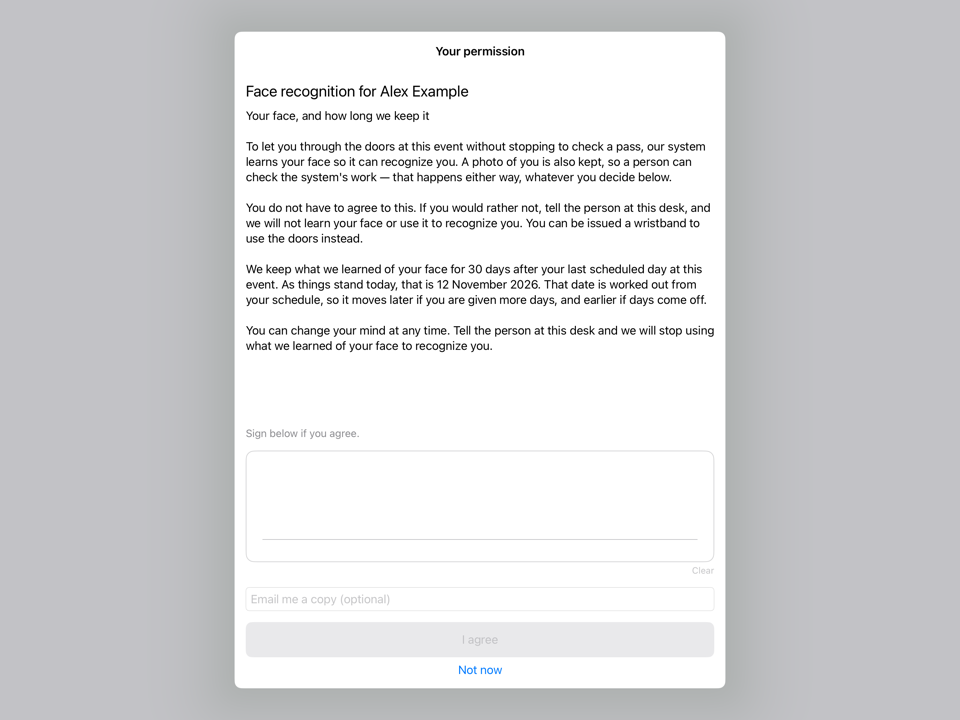 The consent screen on an iPad at the desk. It reads Face recognition for Alex Example, shows the default notice above a signature line, and offers I agree or Not now.